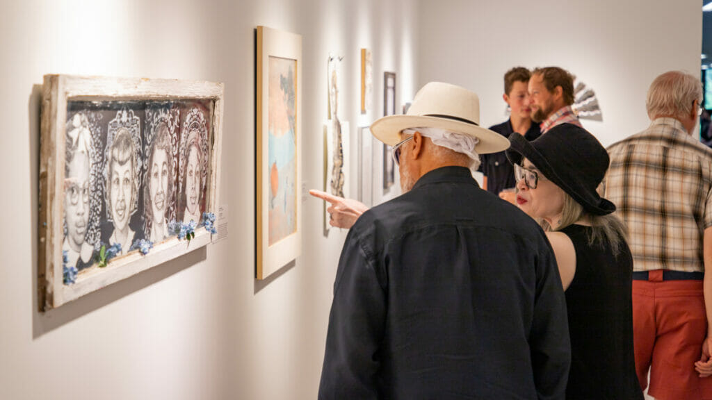 Adults at art exhibit